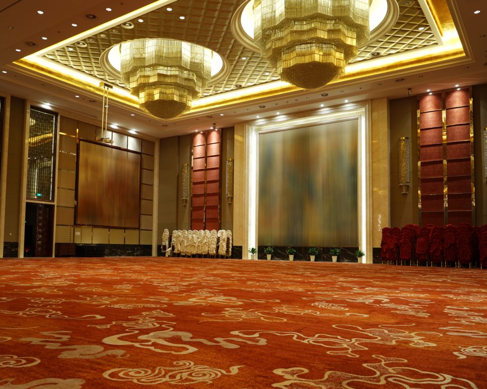 Huge,Hall,Interior,With,Red,Carpet,And,Ceiling,With,Lights